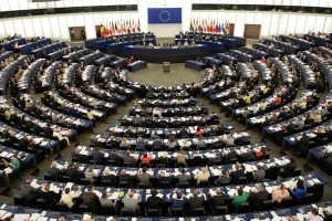 epa03860623 Members of the European Parliament vote during a plenary session at the European Parliament in Strasbourg, France, 10 September 2013. The European Parliament calls for better protection for users of online gambling. EPA/PATRICK SEEGER